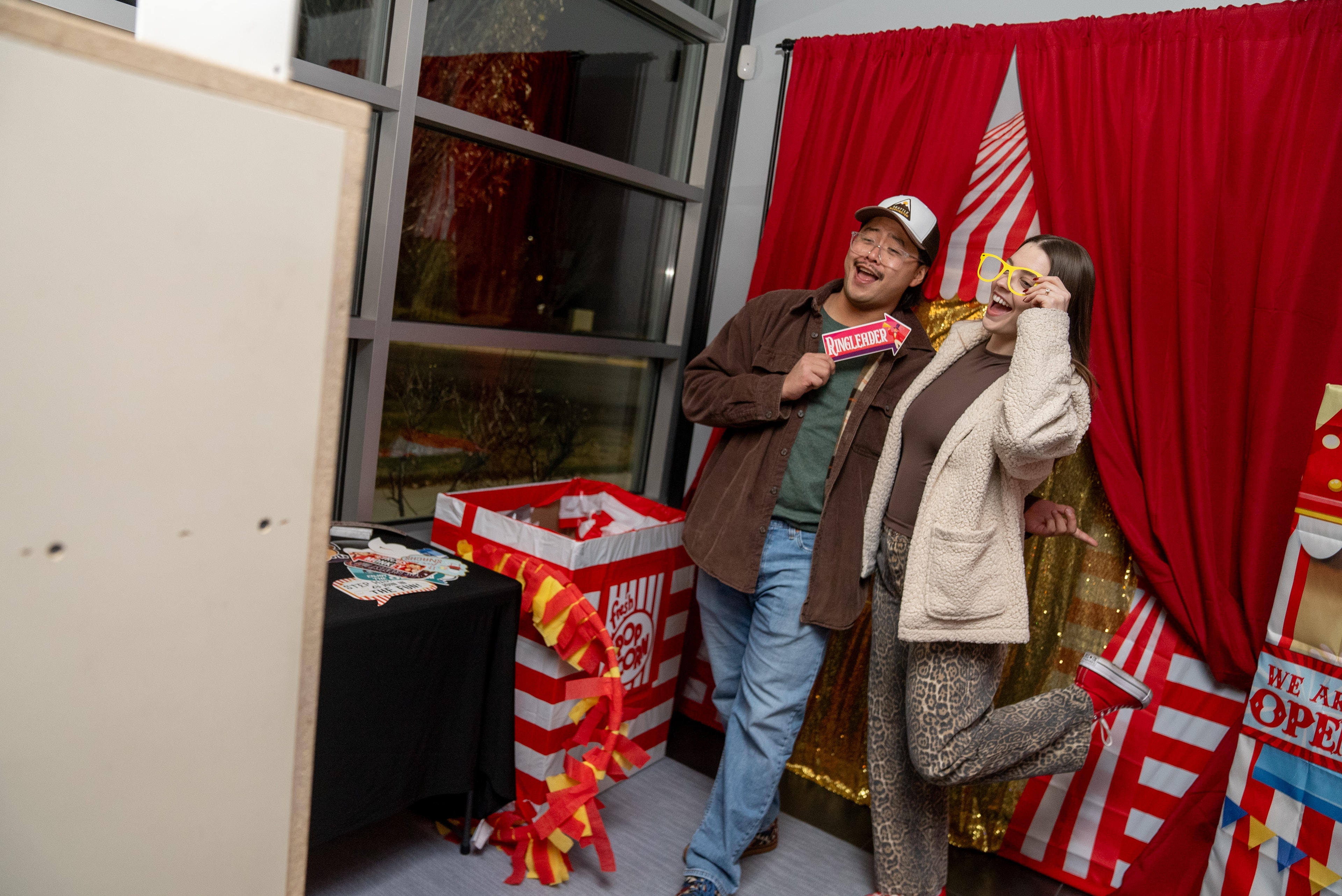 Couple at the vintage movie theater photo booth